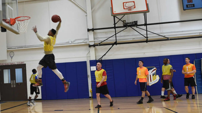 910th Security Forces Defenders participate in an intramural basketball tournament
