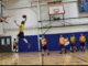 910th Security Forces Defenders participate in an intramural basketball tournament